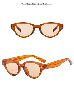 Detail view of retro cat-eye sunglasses featuring wood grain frames and silver rivets