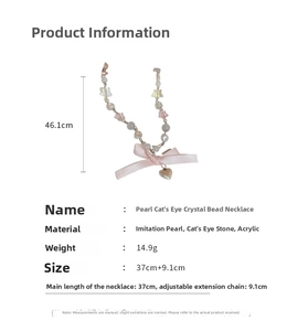 Detail view of opal and pearl necklace with bow, showing 37cm length and 14.9g weight