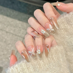 Uñas postizas cat-eye elegantes con mariposa 3D y perlas para mujer