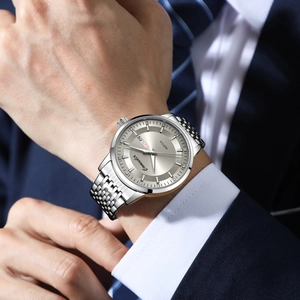 Men's skeleton mechanical watch with silver metal strap and day-date display