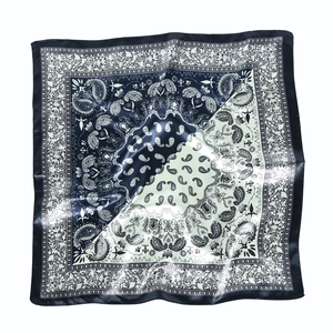 Navy blue and beige paisley square silk scarf with vintage floral border on white background
