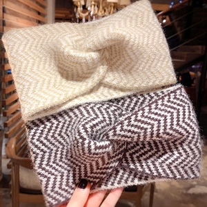 Women's thick knit striped headbands featuring classic crossover twist and warm fabric