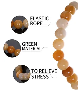 Detail view of elastic bead bracelet with calming yellow agate stones and green materials