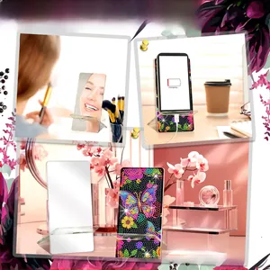 L-shaped acrylic phone holder with diamond painting art and integrated makeup mirror