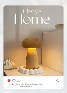 Close-up of a mushroom desk lamp with wood grain finish and warm LED glowing effect