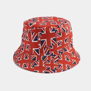 Detailed close-up of Union Jack flag print and stitching on the red reversible bucket hat