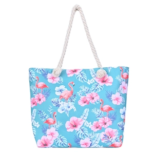 Blue canvas beach bag with flamingo and hibiscus print and beige rope handles