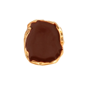 Detailed top view of vintage irregular gold ring with deep red enamel square inlay