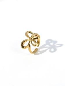 Detailed top view of a gold 18k plated stainless steel ring with a hollow butterfly design