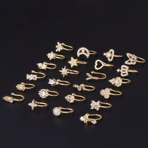 Detailed set of 21 gold plated nose cuffs featuring zircon stars, moons and snakes