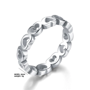 Macro shot showing 4mm width and 5g weight details of hollow heart stainless steel ring