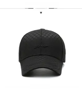 Detail of black baseball cap featuring plaid texture and 3D SPORT embroidery design