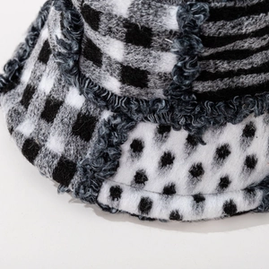 Winter wool houndstooth bucket hat with mixed patterns and warm fringe details