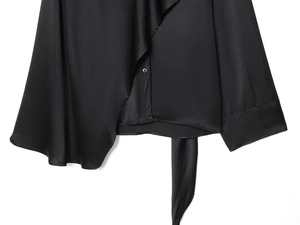 Detailed macro shot showing the black satin fabric texture and premium hem stitching