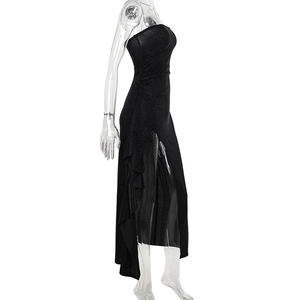Detailed side view of black glitter tube dress with high slit and ruffled hem