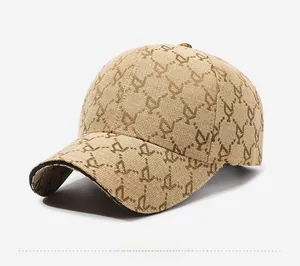 Detailed 45-degree view of a khaki baseball cap featuring repeated letter jacquard patterns