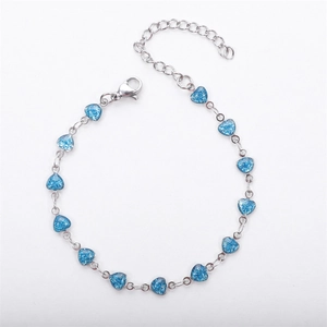 Silver stainless steel bracelet with 13 blue glitter heart pendants and lobster clasp