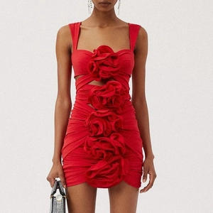 Red cut-out mini dress featuring 3D floral accents and ruched bodycon silhouette