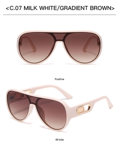 Detail view of milk white large frame sunglasses with gradient brown lenses