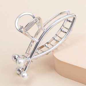 Elegant silver metal hair claw clip with interlocking design and faux pearls
