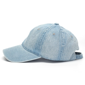 Side view of light blue washed denim baseball cap with reinforced stitched eyelets