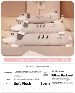 Three sizes of plush dachshund long pillows stacked on a sofa showing gray soft fabric