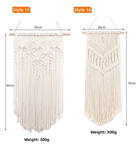 Detailed weave patterns of bohemian handmade cotton tapestries with fringe accents