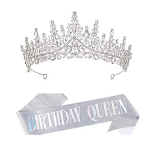 Detail of silver rhinestone birthday crown and glitter sash with Birthday Queen text