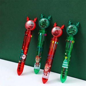 Détail de stylos à bille multicolores de Noël avec bois de renne et paillettes