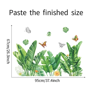 Detail showing tropical monstera leaves and butterfly wall stickers with size dimensions