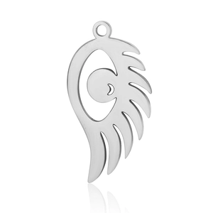 Macro shot of silver evil eye wing pendant made of polished stainless steel for jewelry