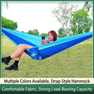 Blue ultra-light nylon parachute hammock for camping with integrated storage bag