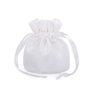 Detailed view of white velvet drawstring gift bag with elegant satin ribbon closure