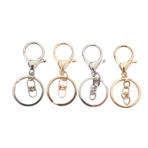 Set portachiavi con moschettone in metallo in finiture argento, oro, oro rosa e cromo lucido