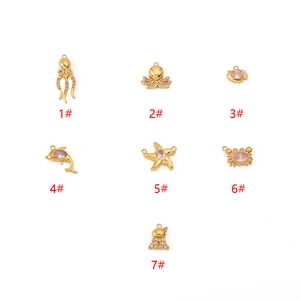 18K gold plated ocean pendants set with octopus, starfish and dolphin charms