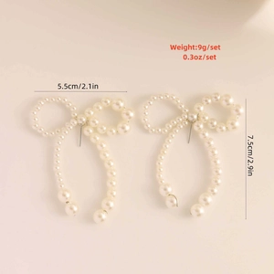Detailed view showing dimensions of elegant faux pearl bow tassel earrings for women