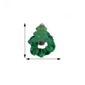 Detail view of green velvet Christmas tree hair scrunchie with size measurements