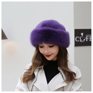 Detailed view of plush purple faux fur winter hat with soft texture and chic dome design