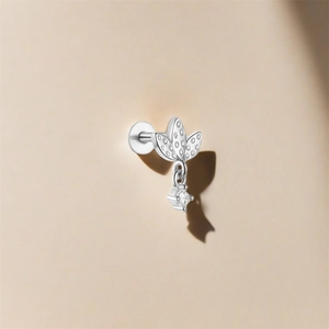 Macro view of s925 silver lotus leaf stud earring with zircon stone and square pendant
