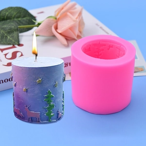 Cylindrical silicone mold featuring 3D reindeer and forest relief for DIY candles