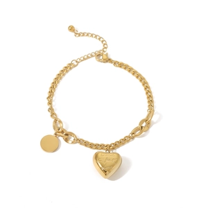 Gold stainless steel link bracelet featuring a round disc and engraved heart pendant
