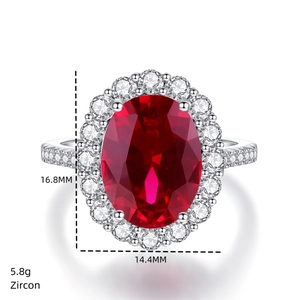 Detailed size view of red oval zircon ring with 16.8MM by 14.4MM cluster setting