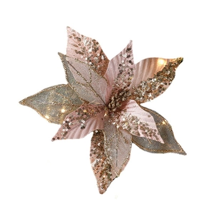 Rose gold Christmas poinsettia decoration with sequins, mesh, and glowing LED lights