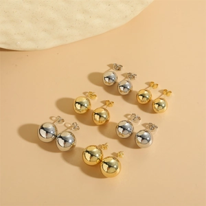 Polished gold and silver stud earring set in three sizes with reflective mirror finish