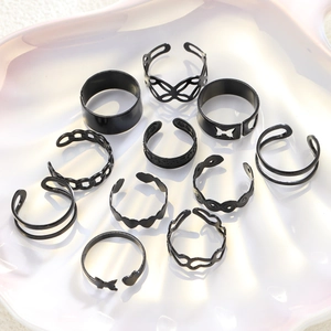 Set of 11 punk style black metal rings with butterfly heart and chain link designs