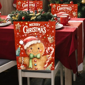 Detail of red Christmas chair cover featuring a cute gingerbread man and festive holiday text