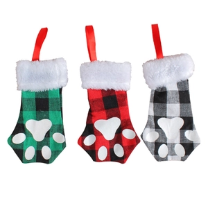 Three-piece cat paw Christmas cutlery holders in red, green, and white plaid fabric