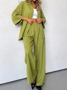 Women's avocado green two-piece set featuring long sleeve shirt and wide leg trousers