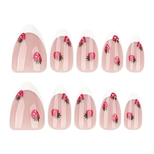 Short almond press-on nails with white French tips and cute red strawberry patterns