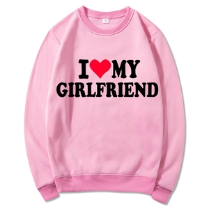 Pink crewneck sweatshirt with I Love My Girlfriend slogan and red heart print for women
